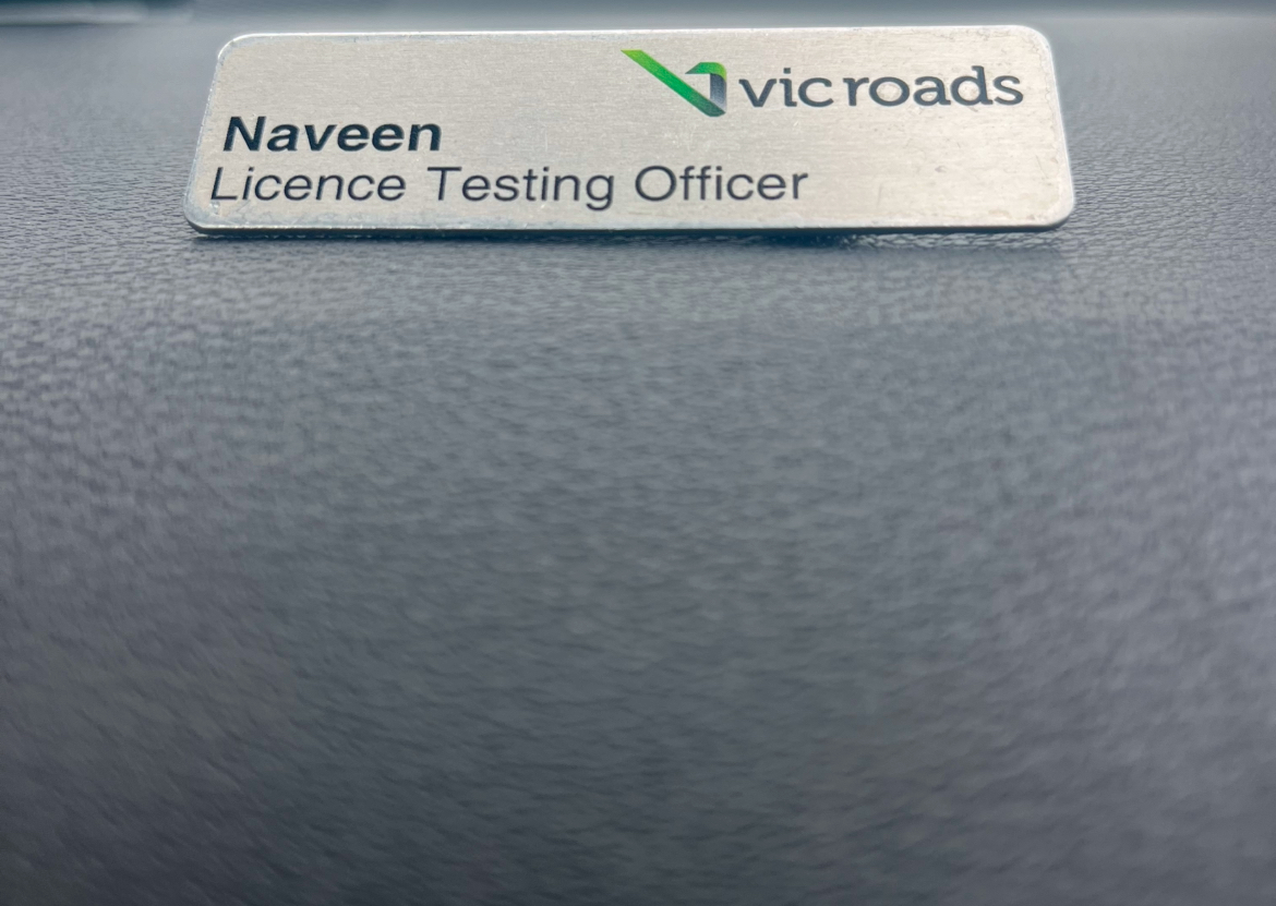 Naveen's VicRoads Licence Testing Officer name badge